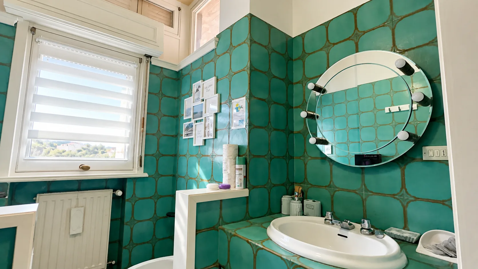 Bathroom with aqua-green tiles