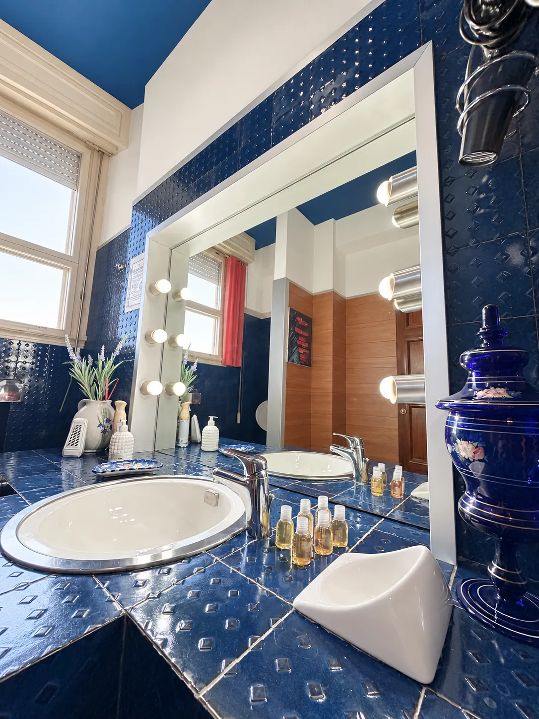 Blue bathroom with double basin